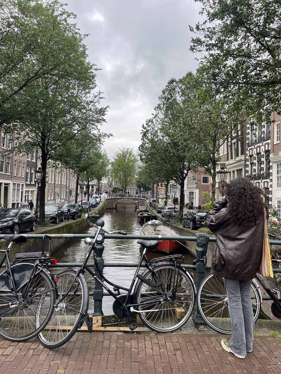 Bikes against rail in front of canal
