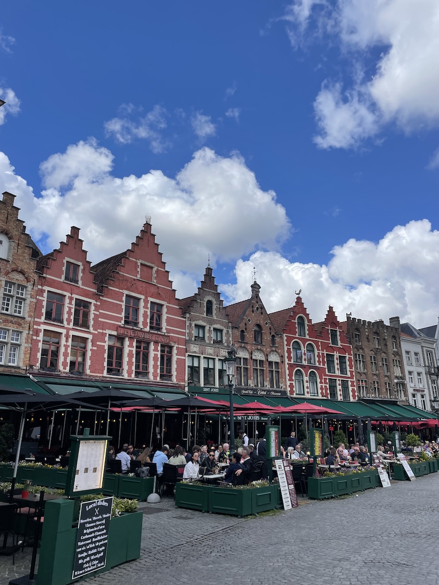 Colorful houses with restaurants that have outdoor tables