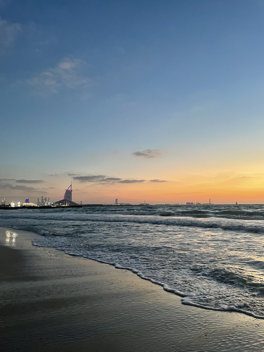 Burj al Arab in background with beach and sunset