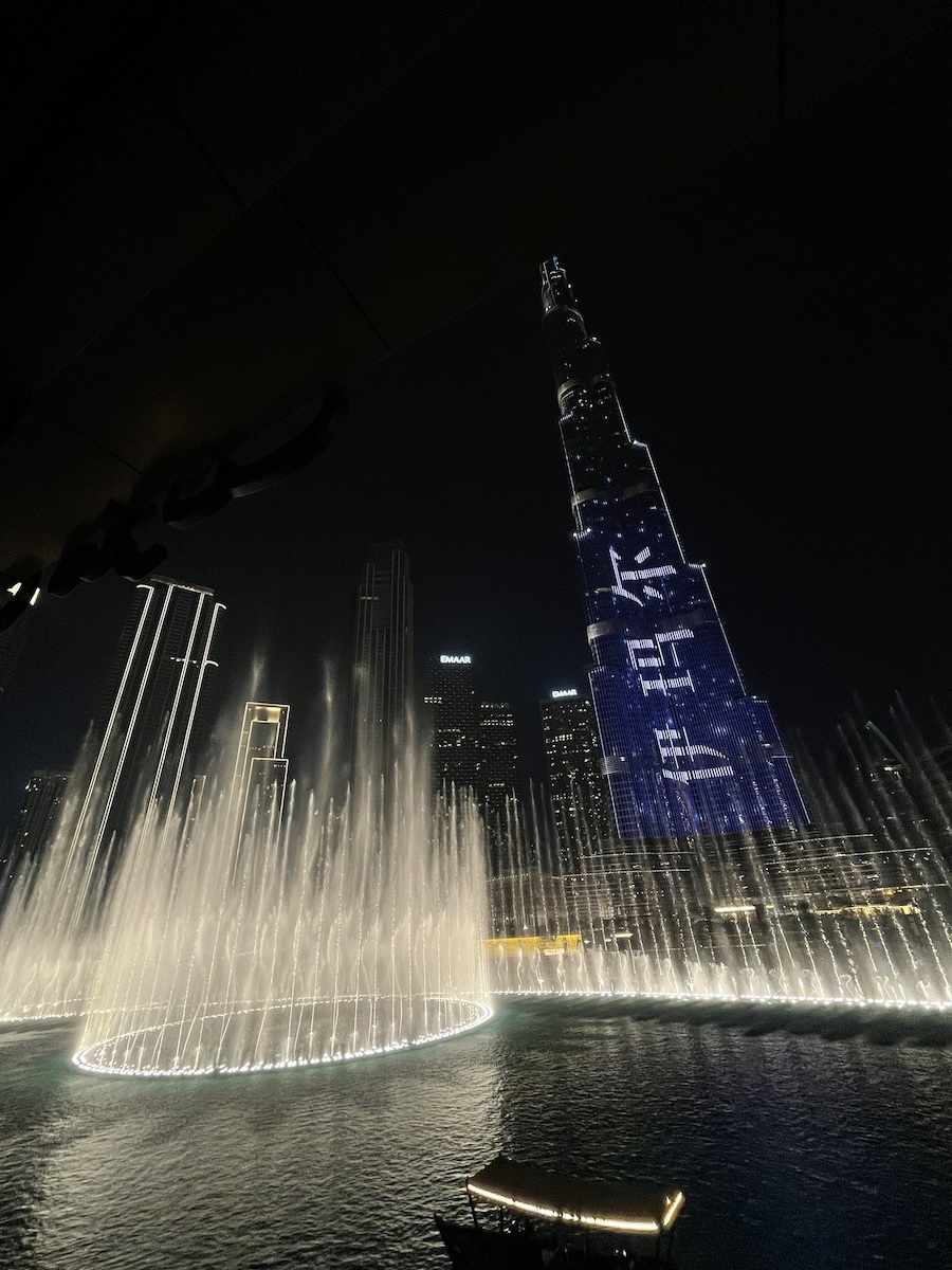 Illuminated fountains in front of Burj Khalifa at night
