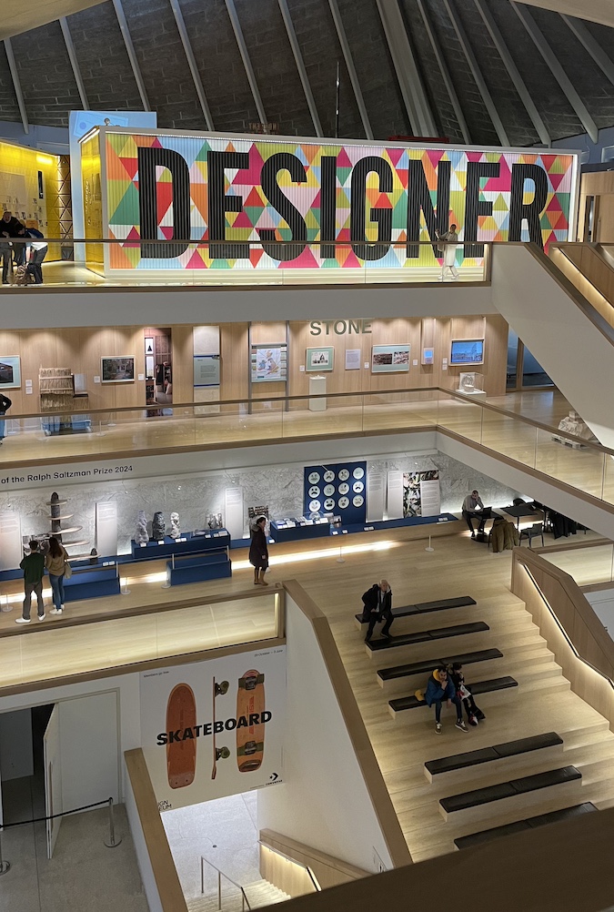 Three floors of Design Museum taken from top floor, with large Designer sign on third floor