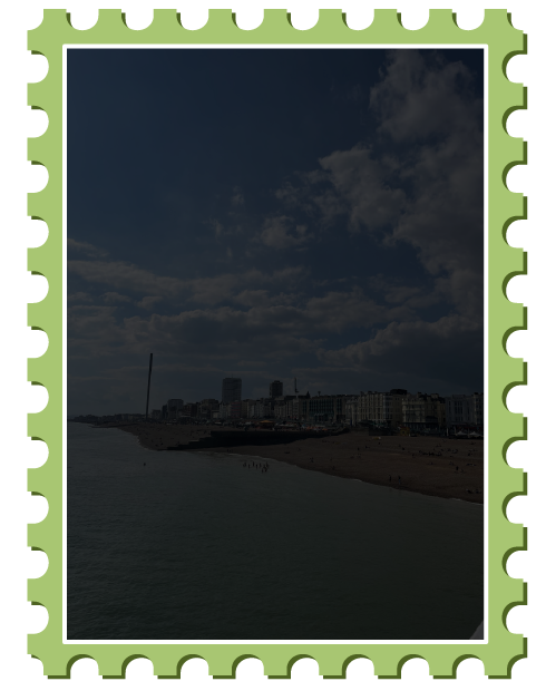 Beach and water on Brighton coast, tinted black to display text