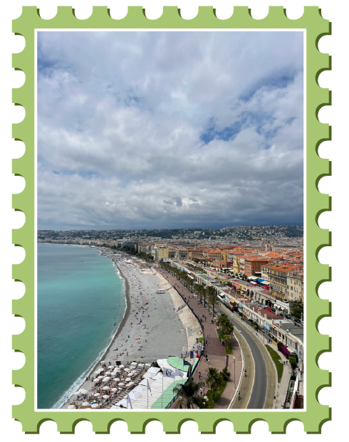 View of Nice coast and orange roof buildings from elevated hill